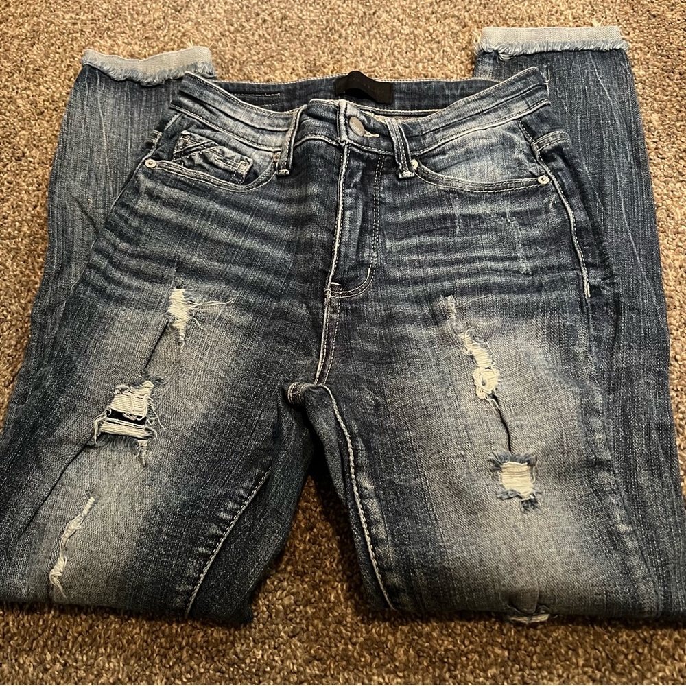 Distressed Blue Jeans